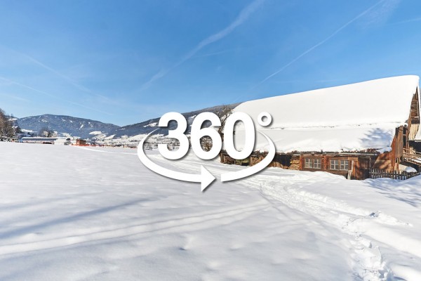 Blick von Ferienhaus Schober auf Skipiste und Skilift in Radstadt